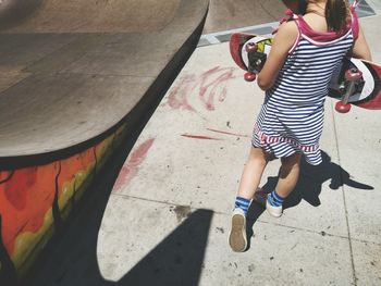 High angle view of boy on floor