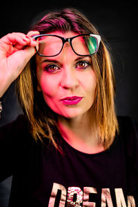 Portrait of beautiful young woman with different lights