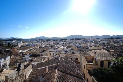 Aerial view of town against sky