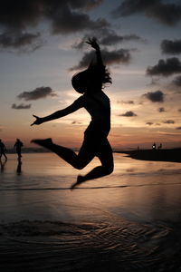 Jumping in sunset