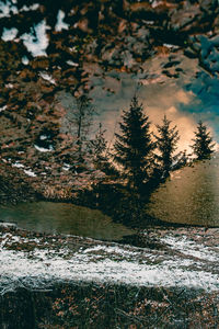 Close-up of wet rippled water during sunset