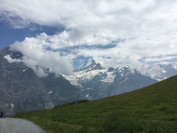 Scenic view of snowcapped mountains against sky