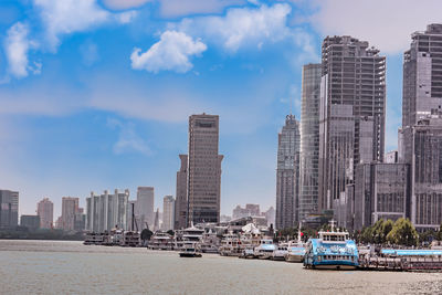 Panoramic view of city buildings against sky