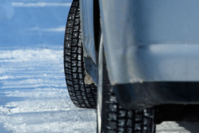 Close-up of tire in snow