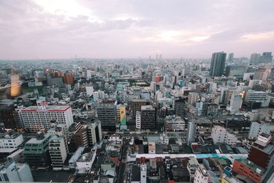 Aerial view of cityscape against sky