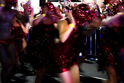 Blurred motion of people in nightclub