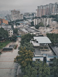 High angle view of street amidst buildings in city