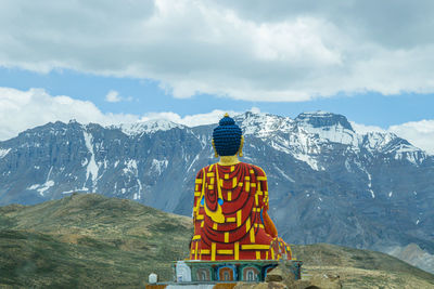 Rear view of person looking at mountain