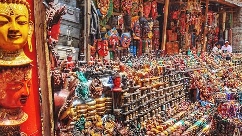 Multi colored sculpture for sale at market stall