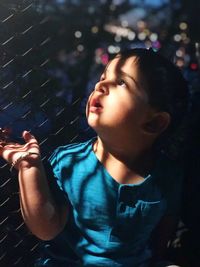 Portrait of cute girl looking away