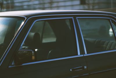 Black car in parking lot 