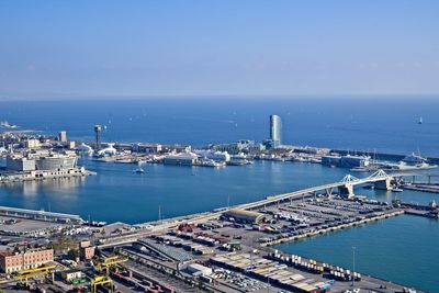 High angle view of harbor by sea against sky