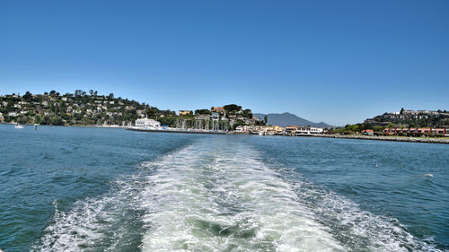 Scenic view of sea against clear blue sky