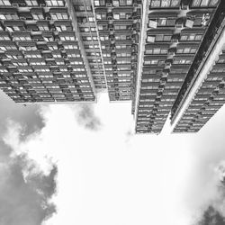 Low angle view of office building against sky