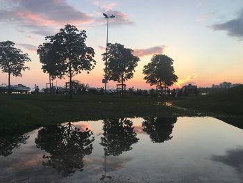 Scenic view of lake against sky during sunset