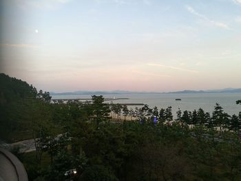 Scenic view of sea against sky at sunset