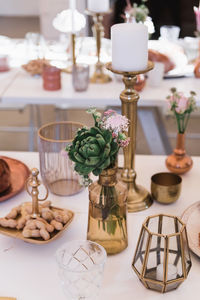 Close-up of wine glasses on table