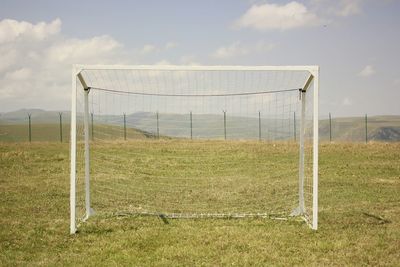 Fence on grassy field