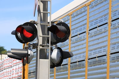 Low angle view of road signal