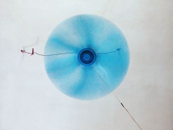 Directly below view of ceiling fan in motion