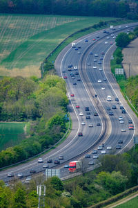 High angle view of vehicles on highway in city