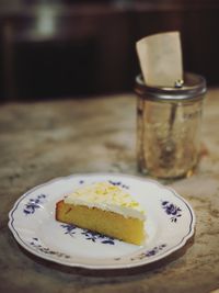 Close-up of cake in plate on table