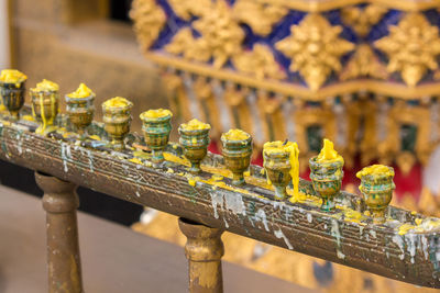 Close-up of metal railing against temple