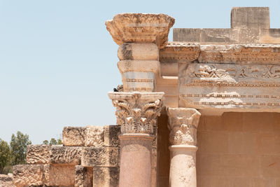 Low angle view of old ruins against clear sky