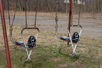 Close-up of swing in playground