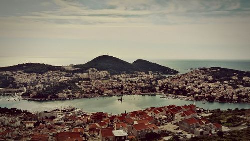 View of cityscape with sea in background