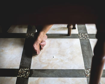 High angle view of man working on floor