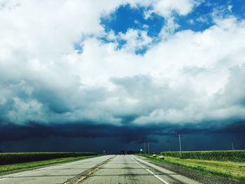 Empty road against sky