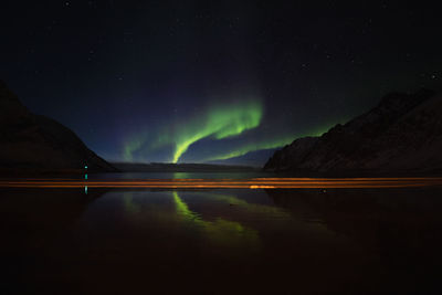   scenic view of aurora against sky at night