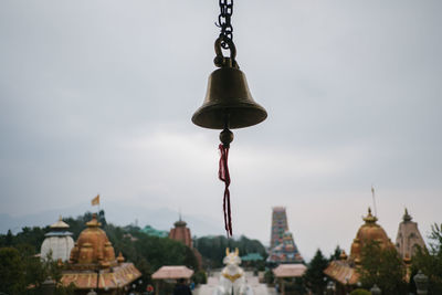 View of temple against building