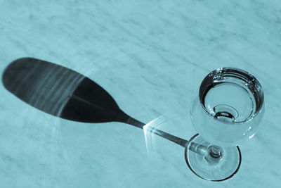 High angle view of drinking glass on table