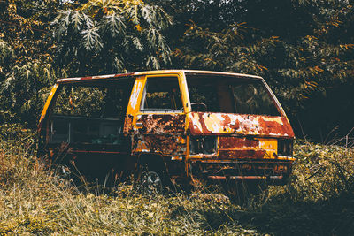 Abandoned truck on field