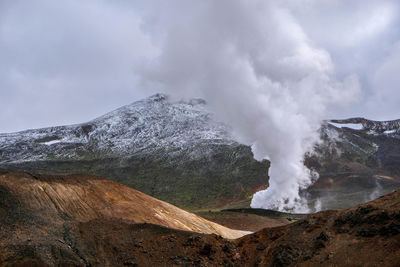 Panoramic view of volcanic landscape against sky