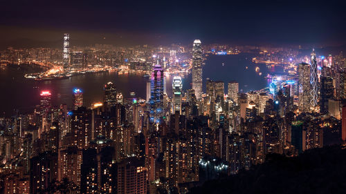 High angle view of illuminated buildings at night