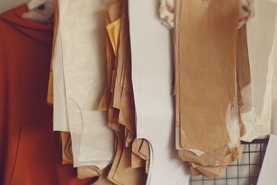 Close-up of clothes hanging on table