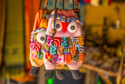 Close-up of multi colored hanging for sale in market