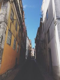 Narrow alley along buildings