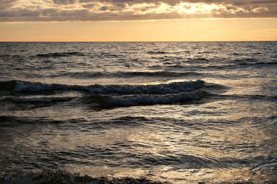 Scenic view of sea against sky during sunset