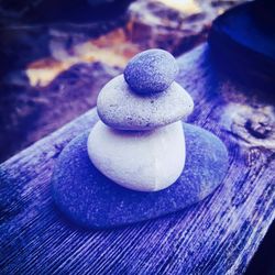 Stack of pebbles on table