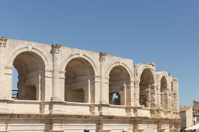 Low angle view of historic building against clear sky