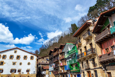 Low angle view of residential buildings against sky