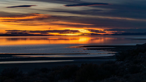 Scenic view of sea against sky during sunset