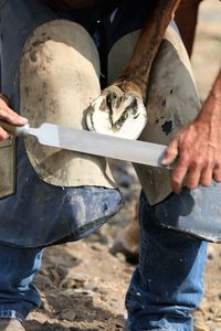 Low section of man working