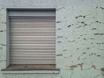 Brick wall with closed door