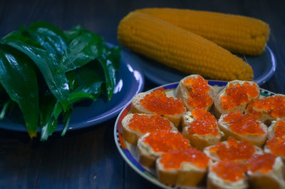 Close-up of chopped fruits in plate