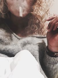 Low section of woman with hands